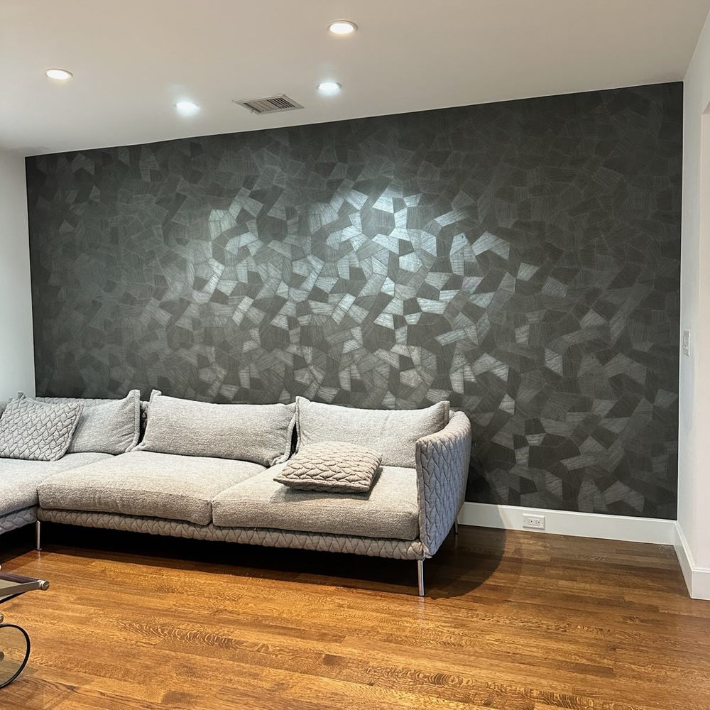 Dark textured wallpaper accent wall